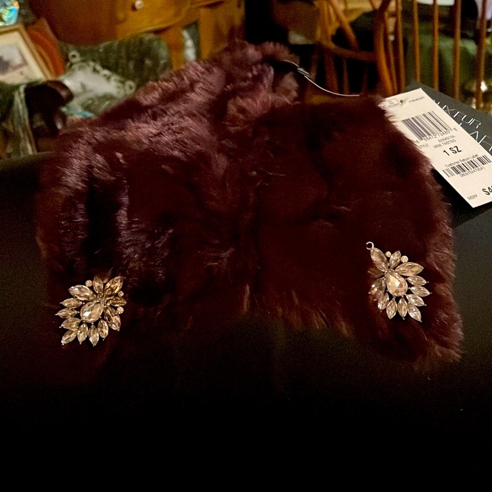 Two fux fur collar’s with costume jewelry. Dress up any outfit,for holidays